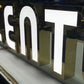 frontlit sign gold trim white lettering